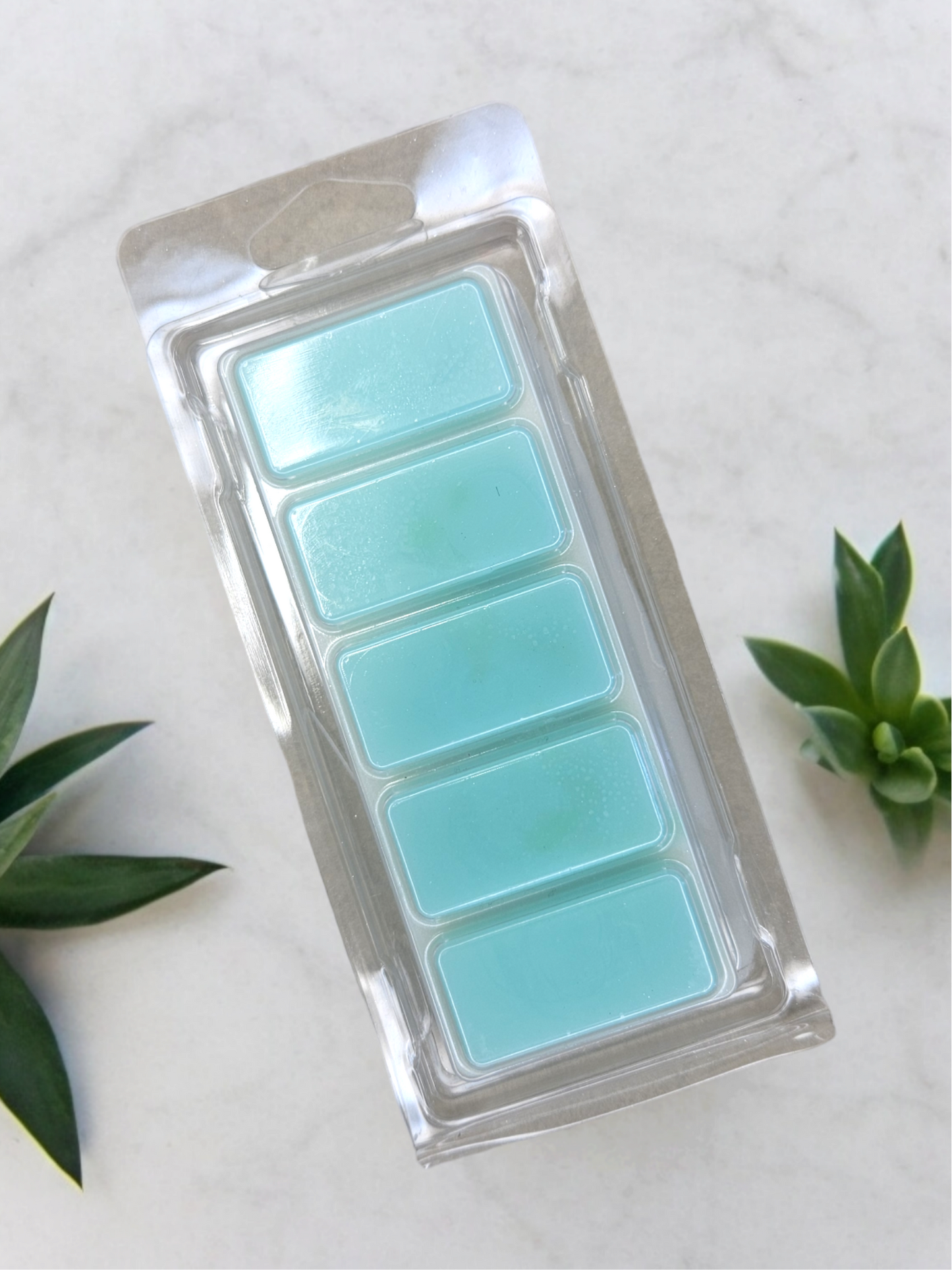 This is a green and white coloured wax melt and is fragranced with Lily of the Valley