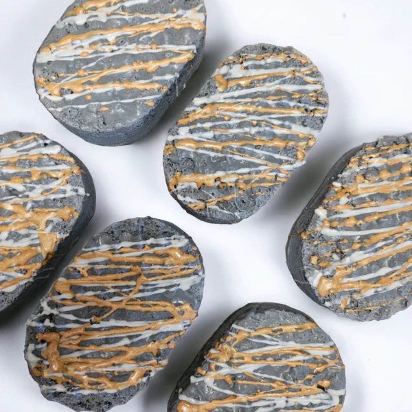 Savage our masculine soap sponge has been immersed in a grey soap that has been infused with our highly scented savage fragrance and finished with a white and gold drizzle