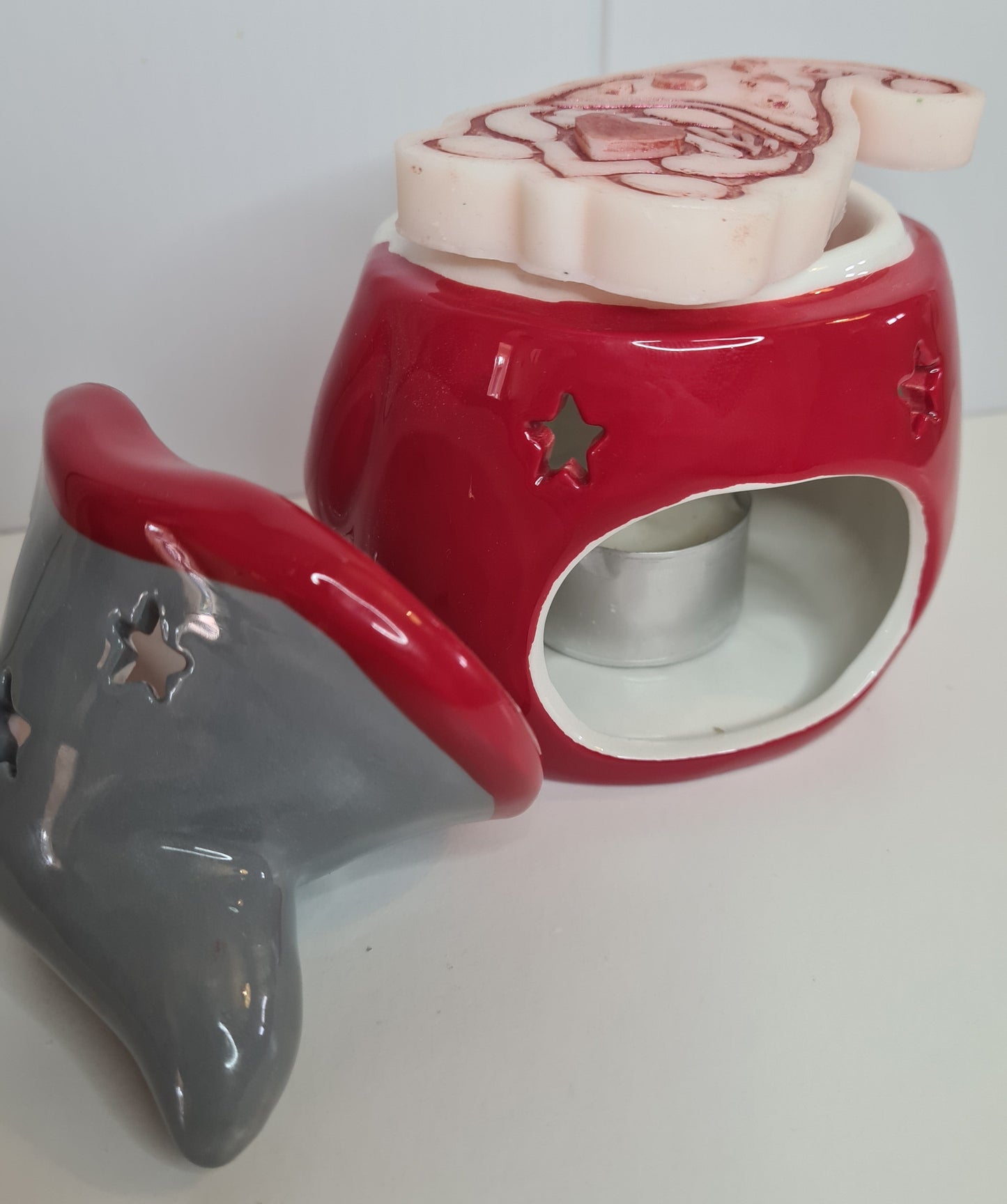 Another view from the side of the gonk wax or oil burner with tea light and gonk wax melt on top