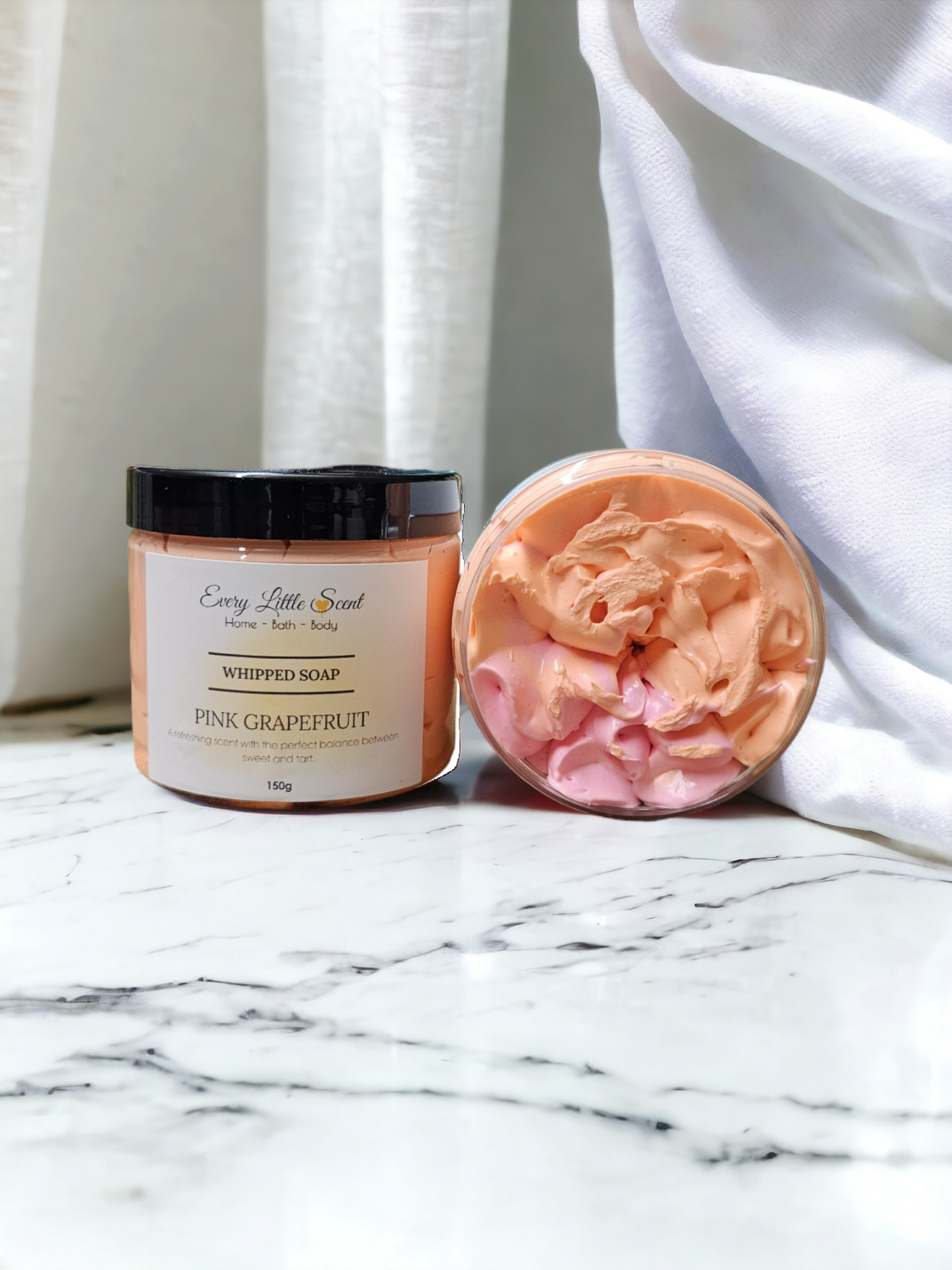 150g pot of our pink grapefruit whipped soap. 