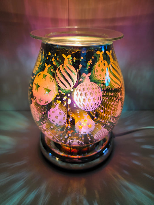 An amazing lamp with the added benefit of being a wax or oil warmer, with a lovely detail of christmas baubles when the light is on