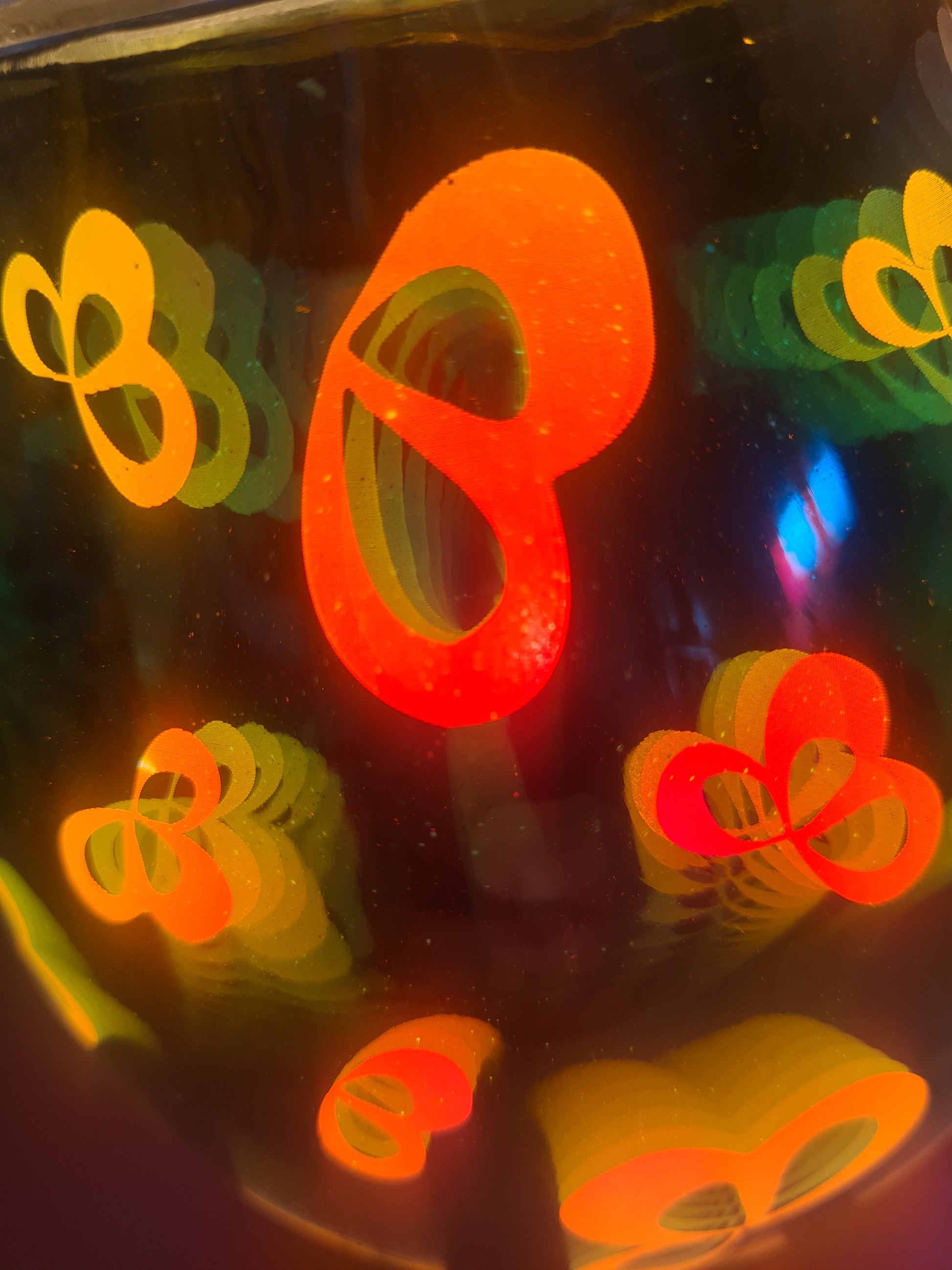 This close up of the lamp shows the detail of the flower petals when lit