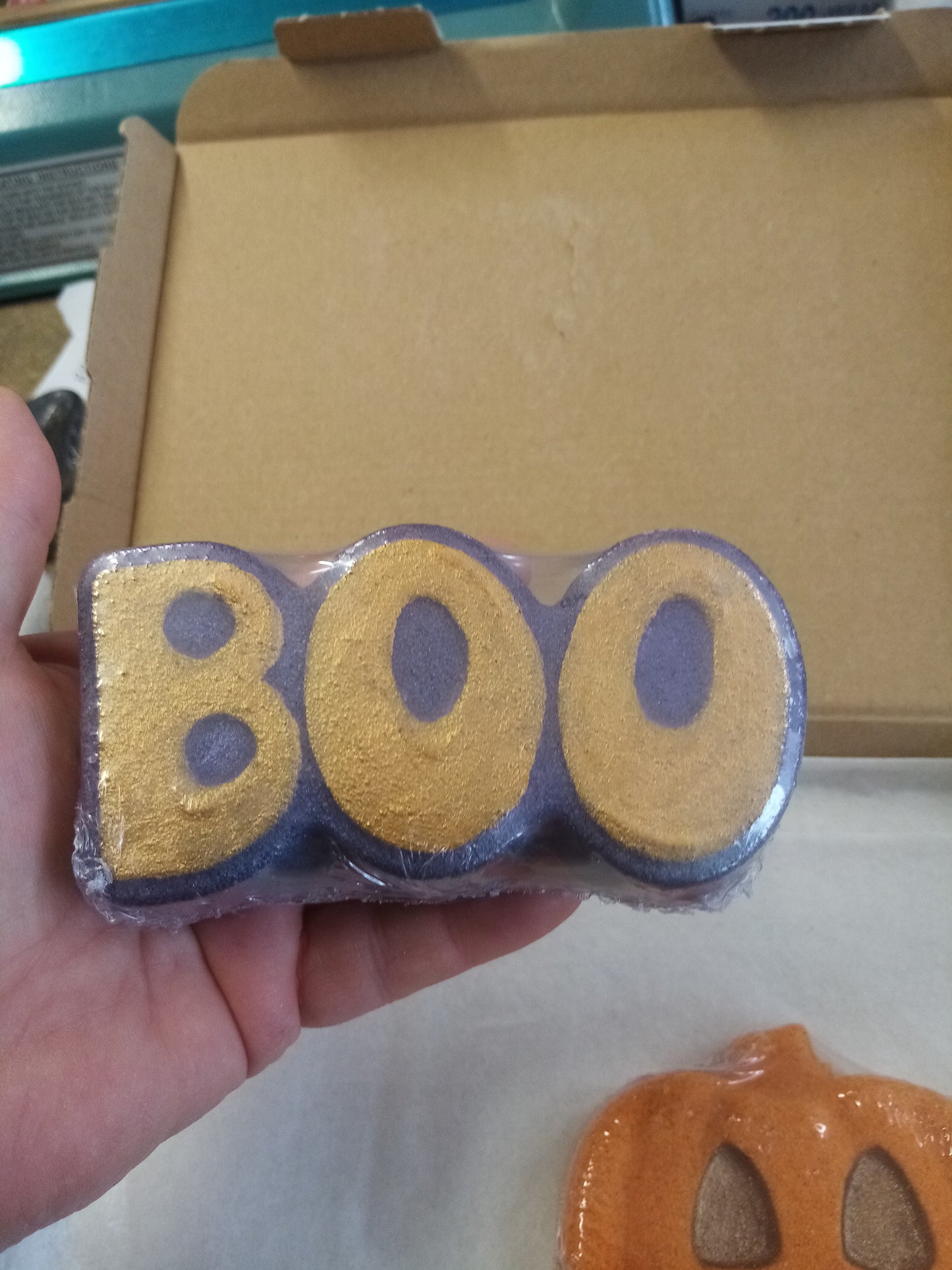 This is pictured in my hand to give you an idea of the size of our Boo Bath bomb