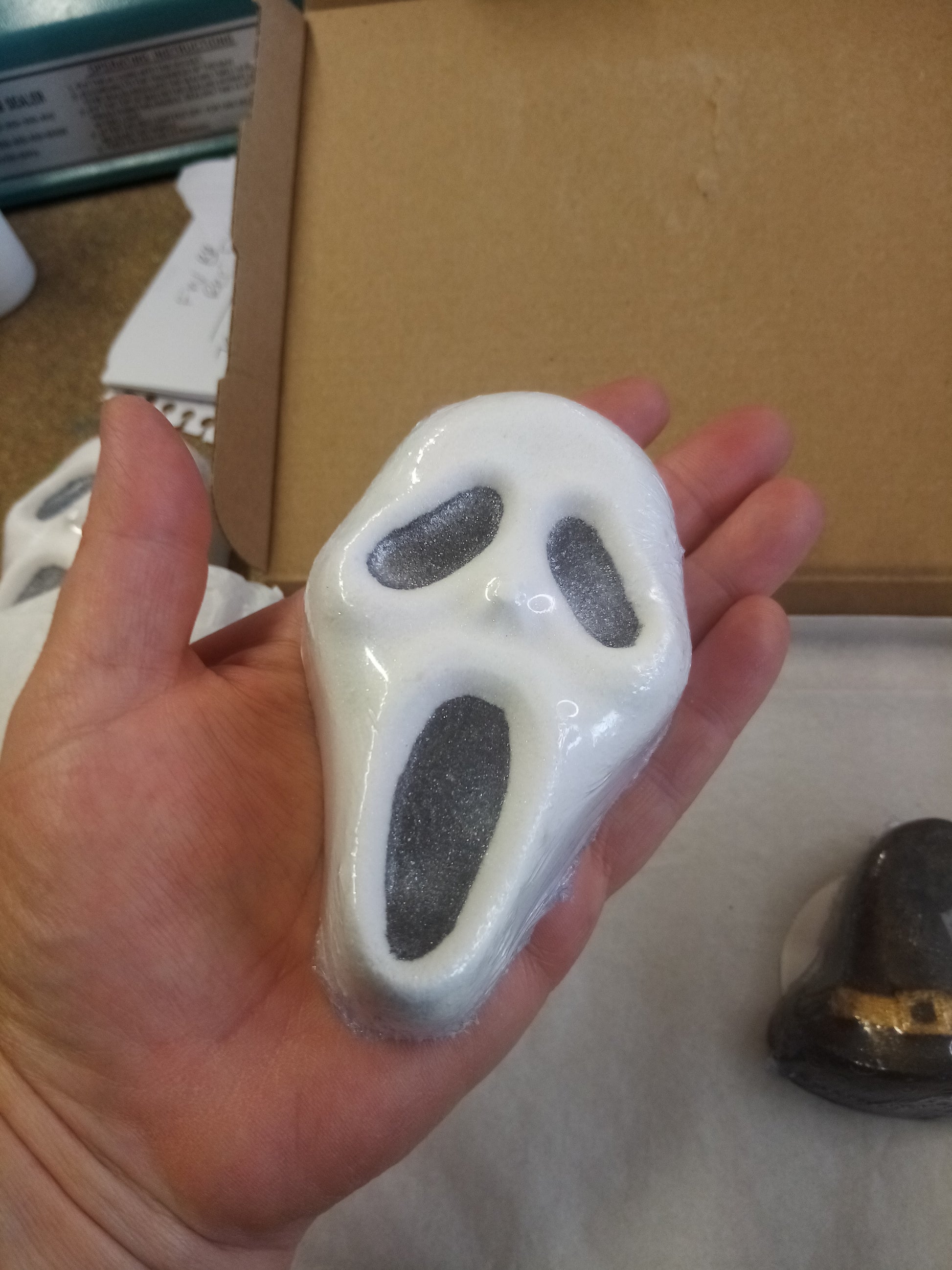 Halloween ghost bath bomb shown in my hand to give the idea of the size 