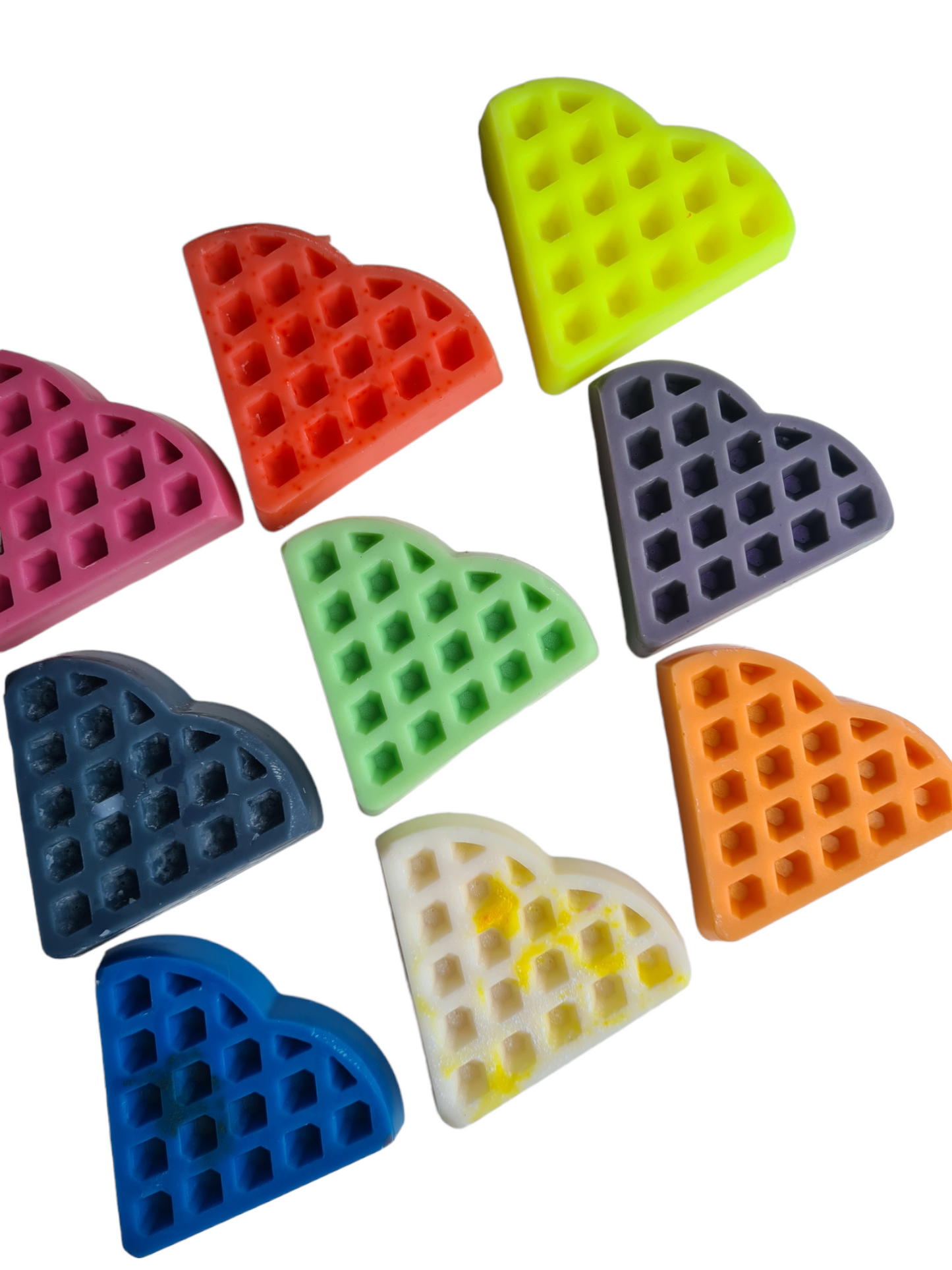 These are waffle Shaped Wax melts you will receive one in a random colour in the scent of your choice 