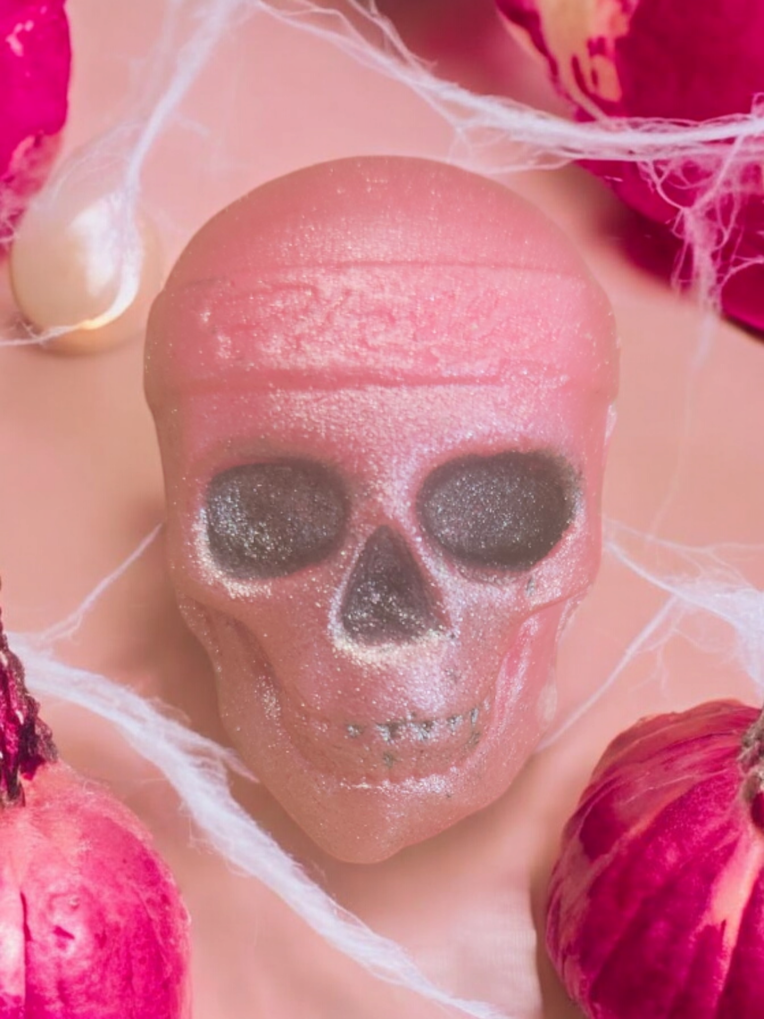 Pink skull shaped wax melt with head band