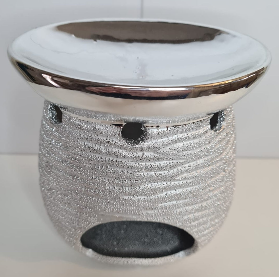 The top of the wax melter has a place for you to add wax.melts, scented sizzlers and oils