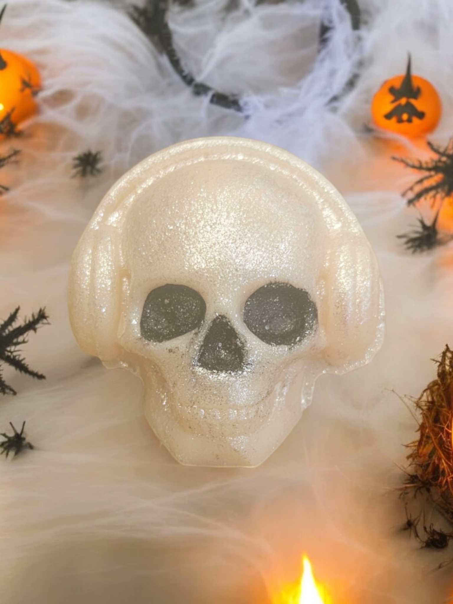 White skull shaped wax melts with ear muffs